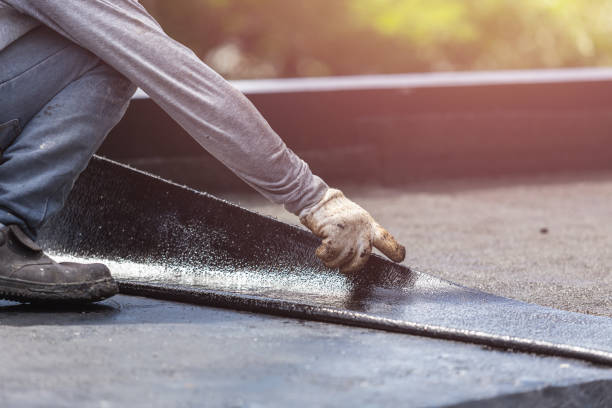 Professional Emergency Waterproofing technician working in Eminence, KY